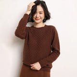 Damen-Pullover aus reinem Kaschmir mit Rundhalsausschnitt. Strukturierter langärmliger Kaschmir-Strickpullover
