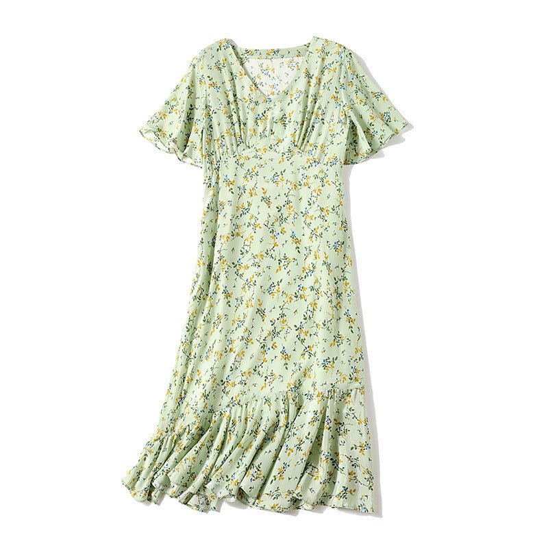 Elegantes Damen-Seidenkleid mit Blumendruck. Reine Kleider aus 100 % reiner Maulbeerseide
